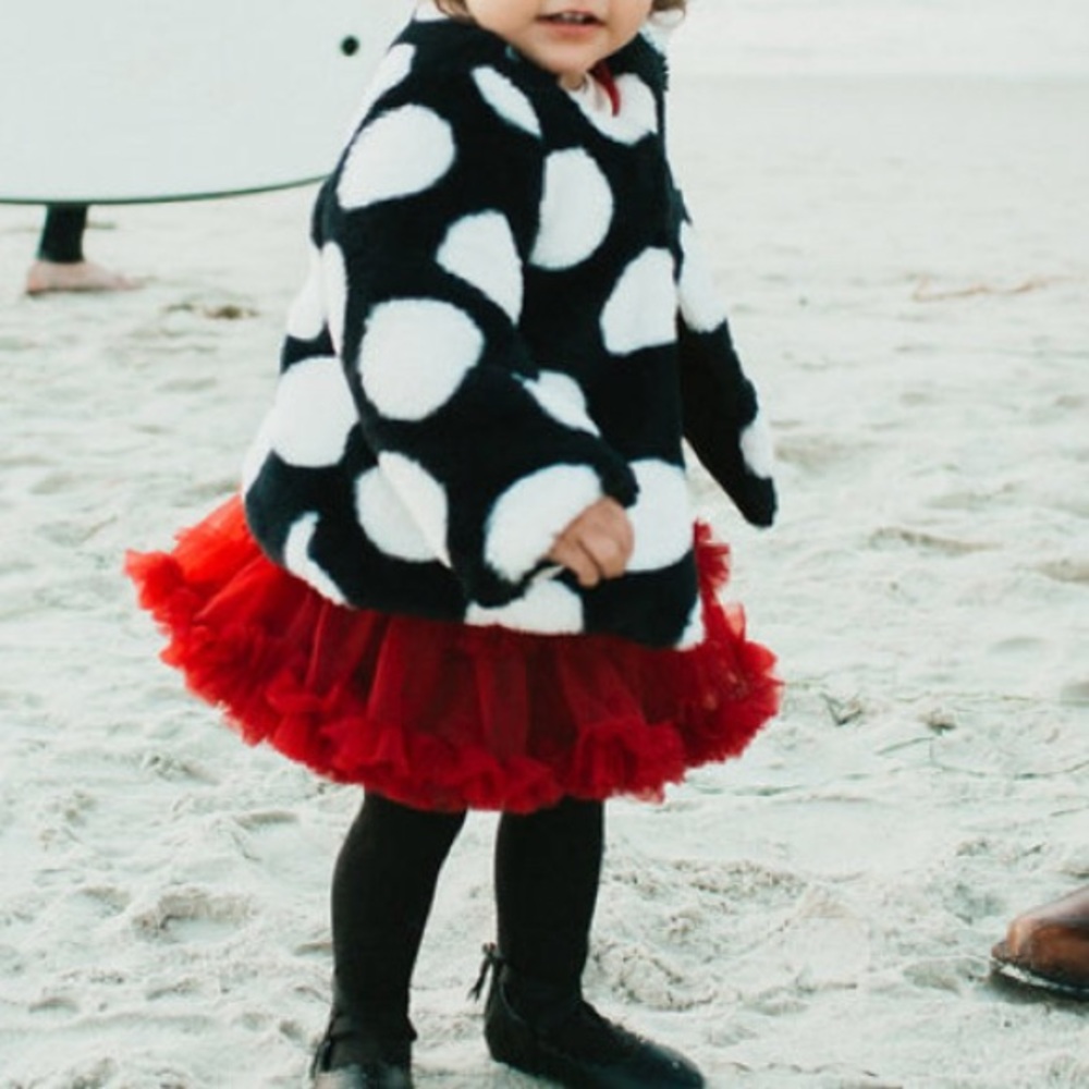Fluffy polka dot toddler jacket.